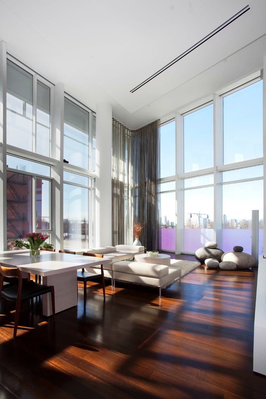 white-living-room-interiors-with-tall-windows
